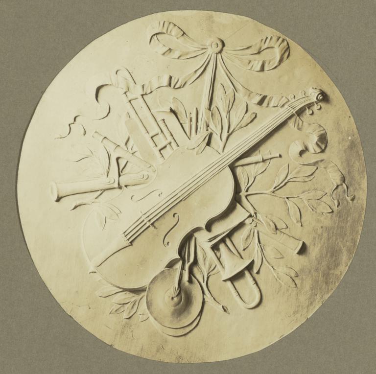 [Roundel with violin, trombone, flute, oboe and cymbals]
