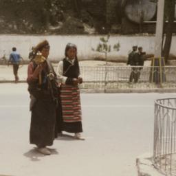 Two Tibetan women in foregr...