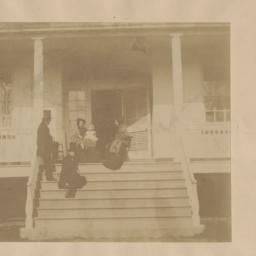 Four People and Baby on Porch