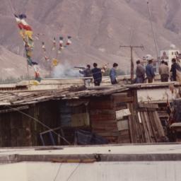 Plain clothes police firing...