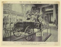 Scenes near the beautiful waterfall, in the Illinois Building. A wagon made of twenty-five varieties of cultivated woods