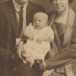 [A Father and Mother Holdin...