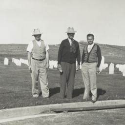 Three Men at a Cemetery