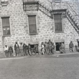 Boys outside of Pawnee Scho...