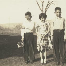 Three Children Posing in Fi...