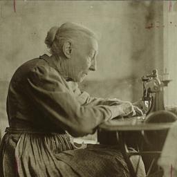 Woman Sewing with Machine