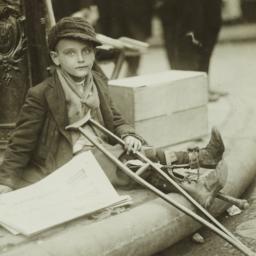 Boy with Crutches Resting A...