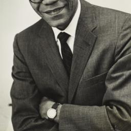 Ulysses Kay with arms folded