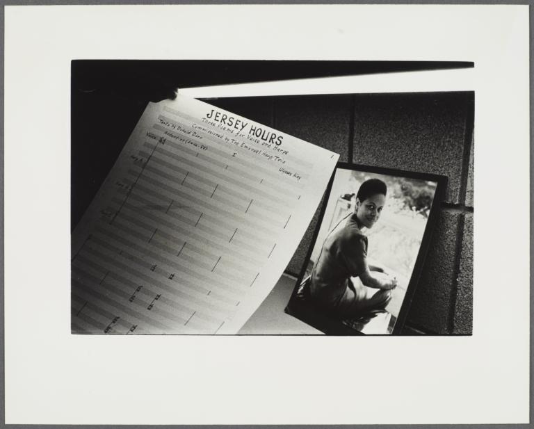 Jersey Hours manuscript beside a photograph of Barbara Kay